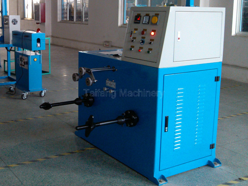 Double axis take-up machine